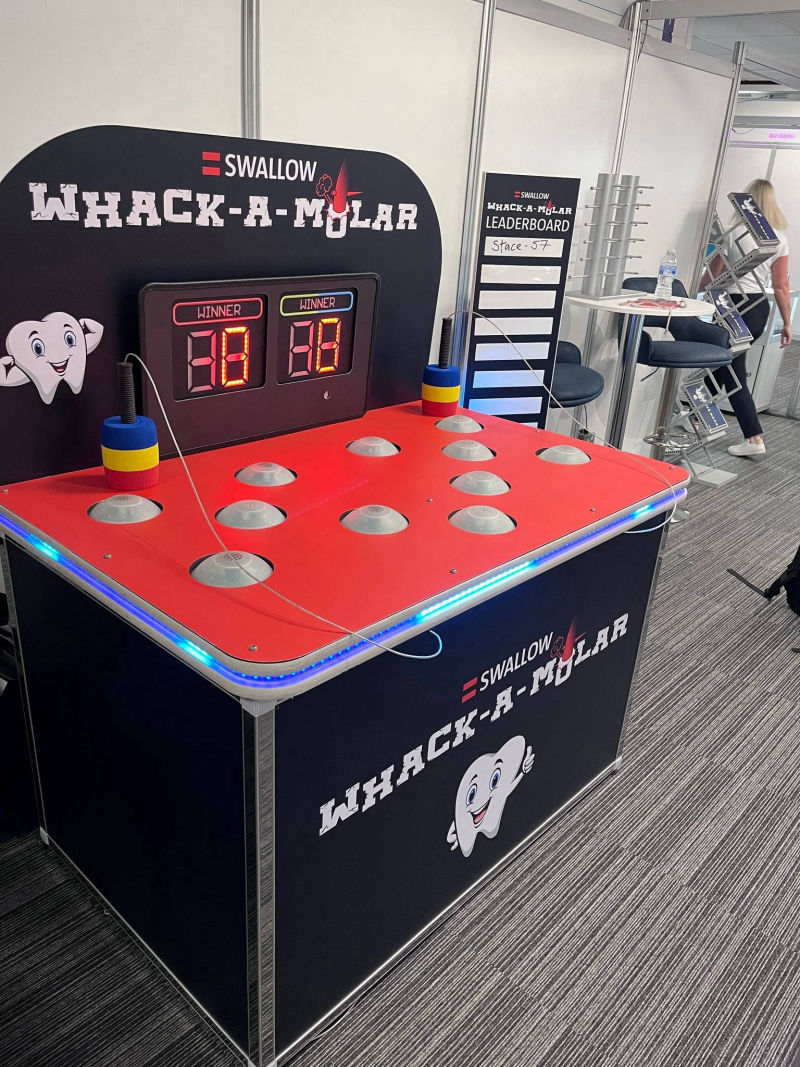 Whack a Molar branding on our Whack a Mole game.